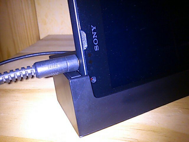 Plug in earphones while Xperia SP is on Dock